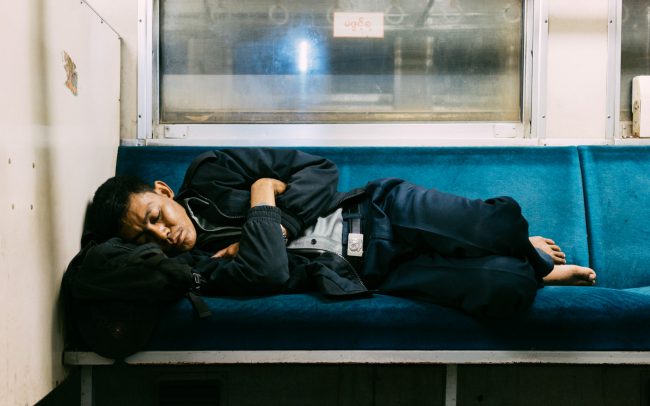 Yangon commuter asleep