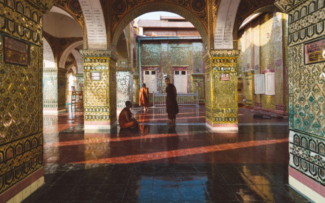 3 monks waiting in a temple [David Tan]