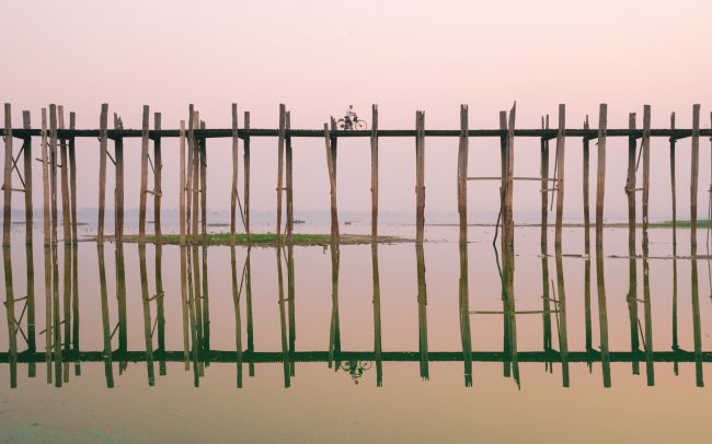 U bein bridge with a cyclist [David Tan]